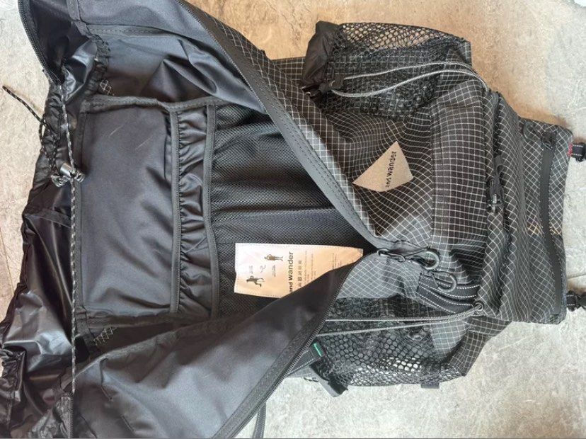 And Wander Reflective Rip 30L Backpack, Men's Fashion, Bags