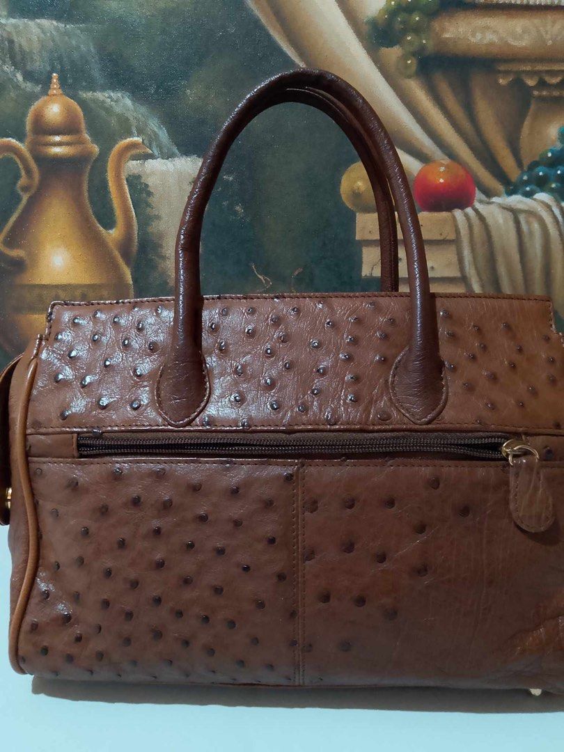 Christian Daniel Italy Birkin Ostrich (Category: Luxury Bags & Wallets) located in Muntinlupa City. Submitted by phbudgetluxuryfinds (Listing ID 1324510547, Image 2). Description: Authentic ostrich bag Gold hardware Rich brown color Preloved not brand new but good condition No damage or repair needed.