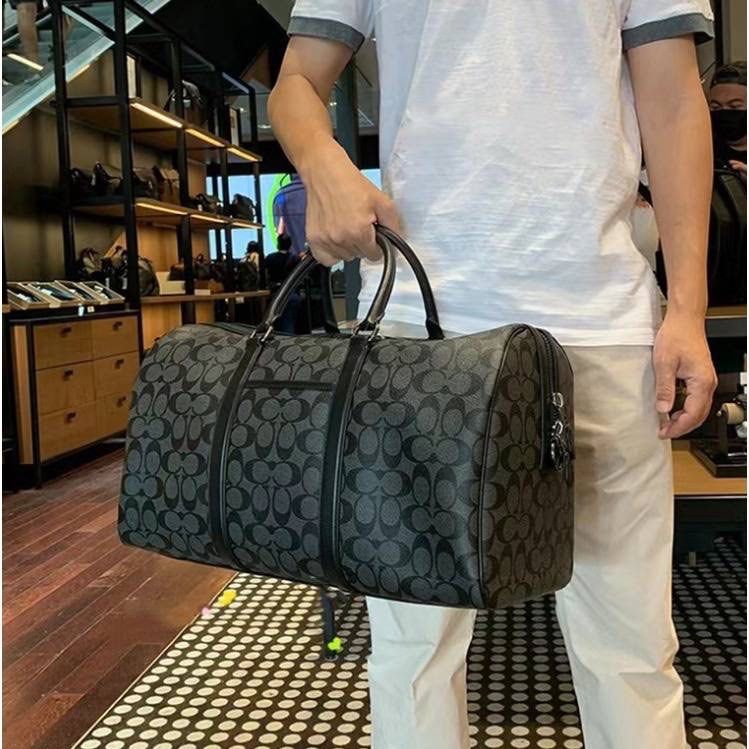 Coach luggage bag best sale