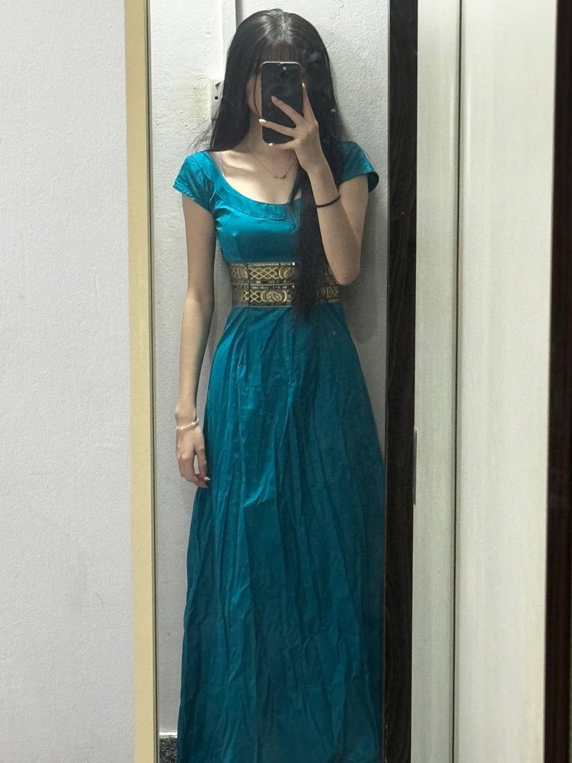 Dark emerald dress shop