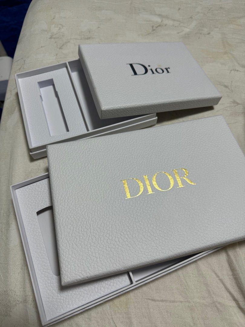 Empty Dior boxes (Category: Accessories) located in Singapore. Submitted by msguiltypleasure (Listing ID 1324453689, Image 3). Description: Empty dior boxes (slight stain on 1 of the box) Selling 1 for $3 and all 3 boxes for $7.