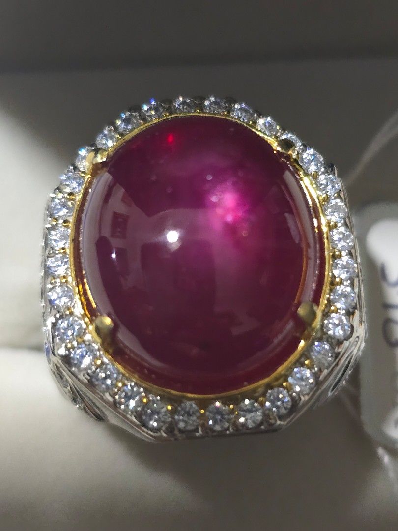 Ruby (Category: Rings) located in Singapore. Submitted by mascurios (Listing ID 1324542713, Image 3). Description: Natural Star Ruby(Corundum) Ring size: 21.5 (Silver) Weight: 23.22ct Measurement: 17.76 x 15.37 x 8.35mm Shape: Oval Cabochon Color: Red (Pigeon Blood) Comment: H(c) Origin: Madagascar Box 97.