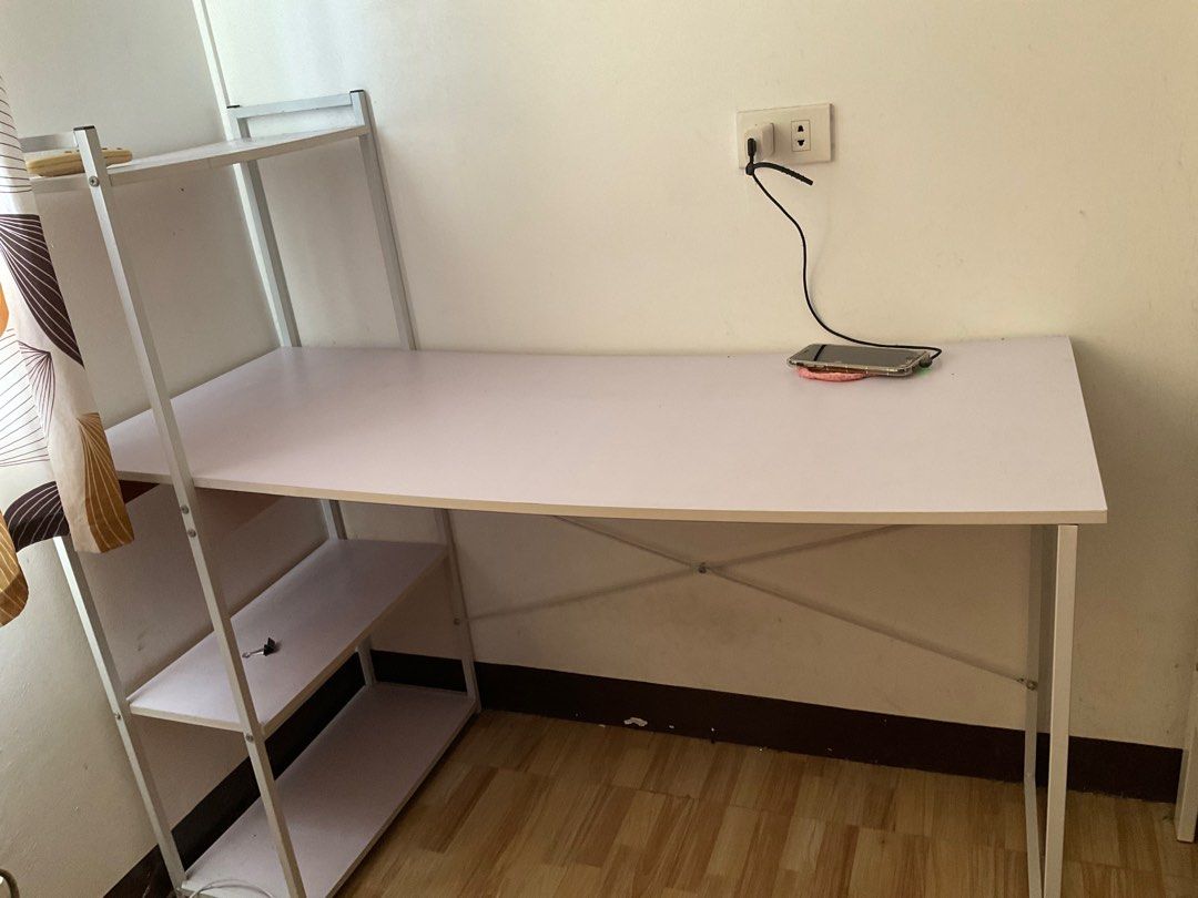 Study Table (Category: Tables & Sets) located in Quezon City. Submitted by scorpszn (Listing ID 1324398554, Image 2). Description: Selling my study table for cheap Bought from 🍊. Size (from app): 120*55*111 It’s already disassembled, but can only take sdd since I have no packing materials for the parts. Used for less than a year. The only defect is there’s 1 missing bolt in the screws, but it still holds up. Rfs: moving out! .