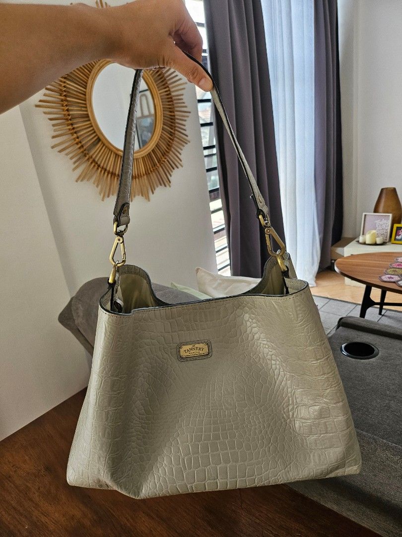 Tannery Manila Anita Tote (Category: Luxury Bags & Wallets) located in Quezon City. Submitted by theclosetoptimist (Listing ID 1324380765, Image 3). Description: SRP around P11k Roomy, versatile, genuine leather bag. Comes with dustbag, leather tag, 2 straps (long to wear crossbody and a shorter one to wear as a top handle / tote). This would make for a great diaper / mommy bag. Exterior clean with barely visible corner scuff marks. Interior need