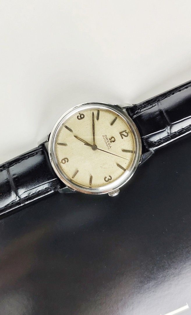 Vintage Omega (Category: Men's Watches) located in Manila. Submitted by ab.authentic.collection (Listing ID 1324532112, Image 2). Description: Available for Sale Vintage Omega - Ref. 165.002 - Cal. 550 - 34mm x 39mm from lugs to lugs - Automatic; Keeps time - Crown unsigned - Aftermarket leather strap fitted - With free travel leather pouch included - Unit only Open for Meetups (Sure buyer) Price: 33,000.