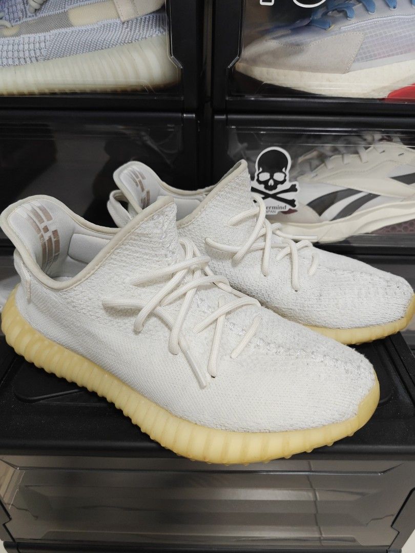 Yeezy triple white retail best sale