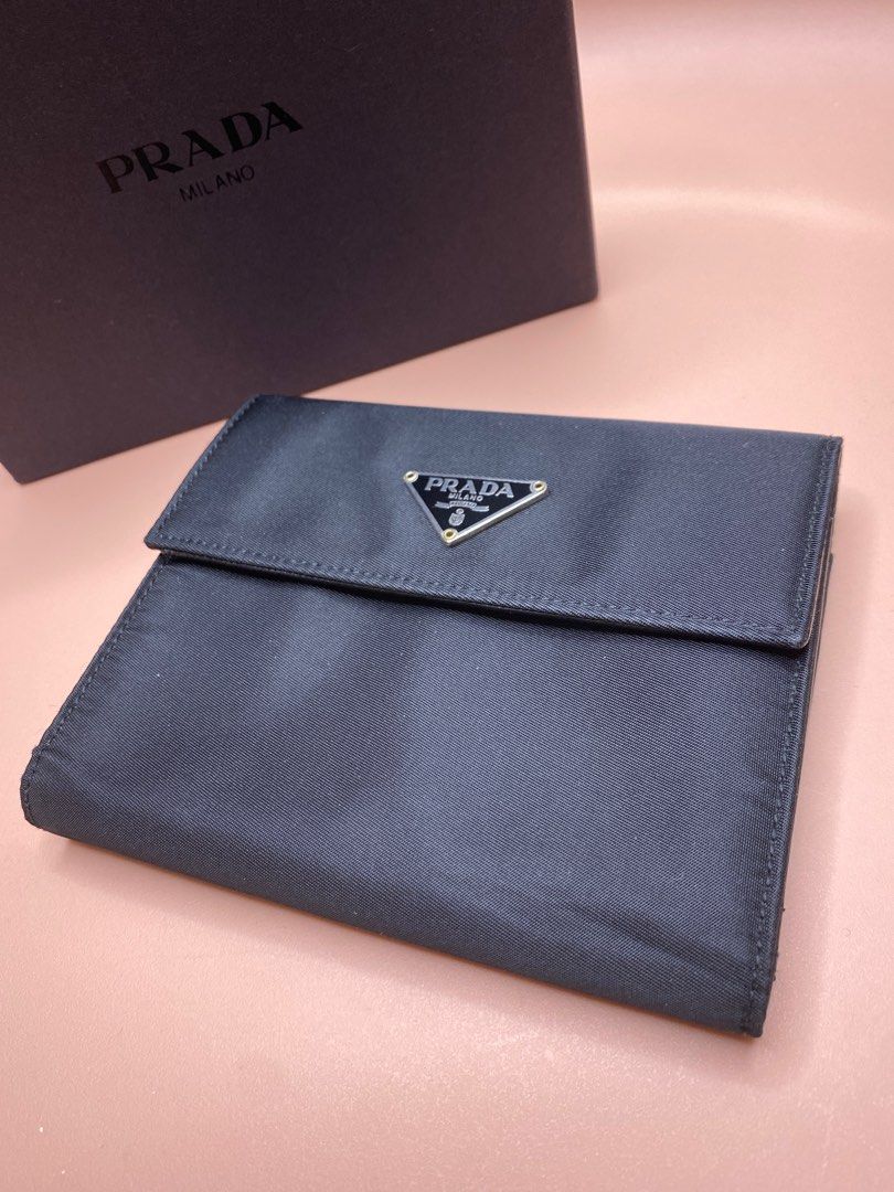 ♡ P R A D A - [Nylon Tri-fold wallet] (Category: Luxury Bags & Wallets) located in Paranaque City. Submitted by cityandsea (Listing ID 1324691550, Image 2). Description: ♡ P R A D A - [Nylon Tri-fold wallet] 🏷️ ₱13,888 Rank B [good condition, with signs of use] * 100% Authentic * Nylon Tri-fold wallet * Size: H 11cm x W 13cm * Color: Black * Inclusions: Box | authentication card * Color may vary due to photographic lighting - First mine and send
