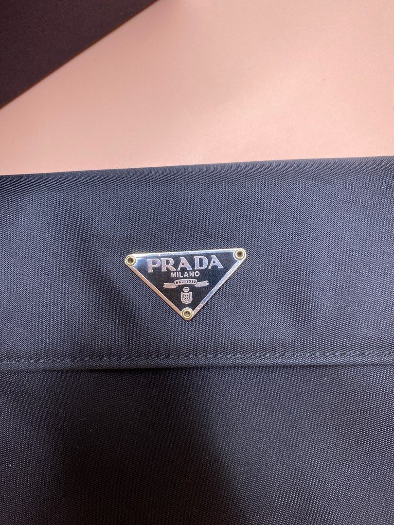 ♡ P R A D A - [Nylon Tri-fold wallet] (Category: Luxury Bags & Wallets) located in Paranaque City. Submitted by cityandsea (Listing ID 1324691550, Image 3). Description: ♡ P R A D A - [Nylon Tri-fold wallet] 🏷️ ₱13,888 Rank B [good condition, with signs of use] * 100% Authentic * Nylon Tri-fold wallet * Size: H 11cm x W 13cm * Color: Black * Inclusions: Box | authentication card * Color may vary due to photographic lighting - First mine and send