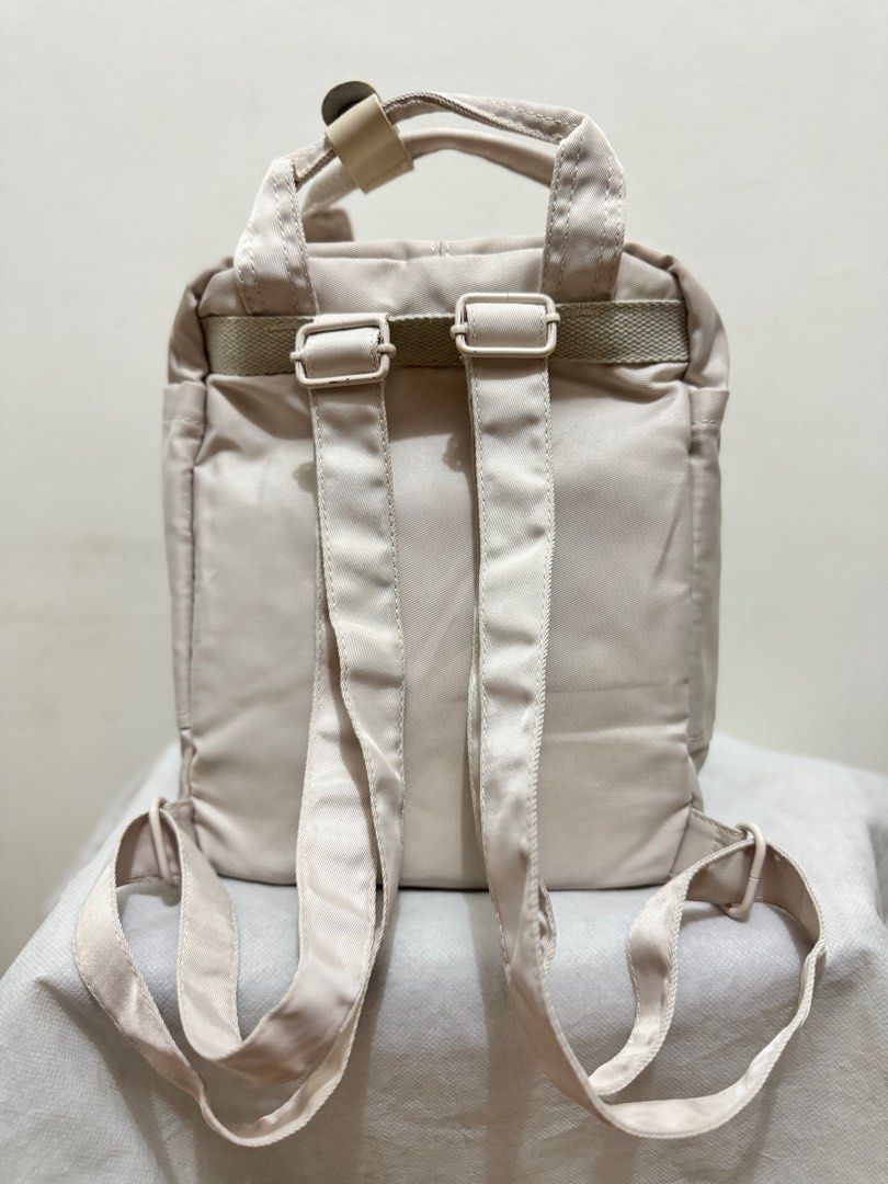 Authentic Doughnut Mini Backpack (Category: Backpacks) located in Valenzuela. Submitted by mnstr.boutique (Listing ID 1324717520, Image 2). Description: Doughnut Mini Backpack 💫Condition: Original/Preloved 💫Color: White 💫Backpack 💫MOP: Gcash / BDO 💫Onhand Tags: #onhand #onhandph #doughnutph #doughnut #backpackph #backpack #bpph #bp #whiteph #white #originalph #original #prelovedph #preloved #mnstrboutique.