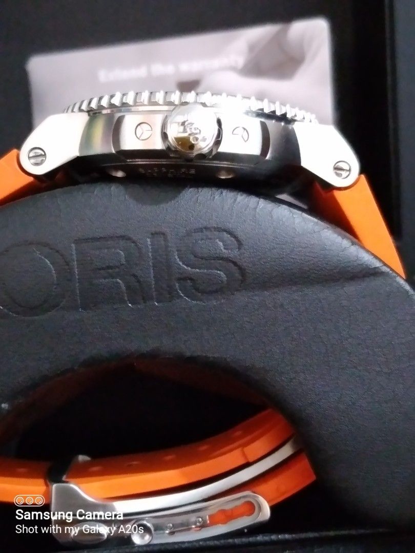 FS:Oris aquis watch (Category: Men's Watches) located in Las Pinas. Submitted by highlyfavored66 (Listing ID 1324613915, Image 3). Description: Swiss made original Oris aquis watch. Can be rated 9/10. 43mm case diameter. Bought at Washington jewelry store at ATC. Complete with box, manuals, guarantee card.Watch is in good condition with no scratch on bezel and sapphire glass. Price can be negotiated but must be reasonable. I can do meet ups along