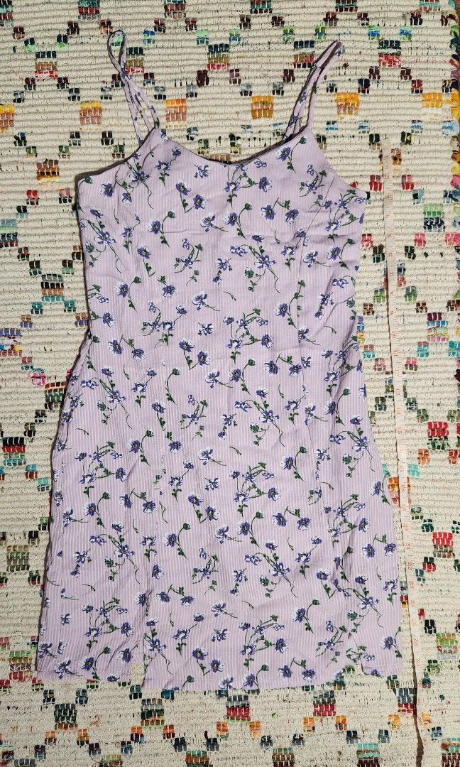 Lavender floral spaghetti strap mini dress (Category: Dresses) located in Makati City. Submitted by beabbbea (Listing ID 1324585659, Image 2). Description: very pretty color and print fits s shipping via lalamove/lbc or grab.