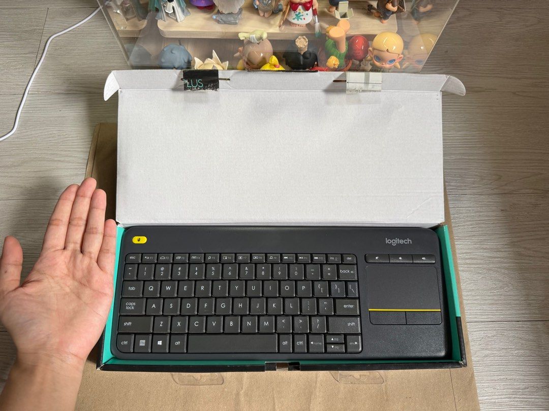 LOGITECH WIRELESS KEYBOARD WITH TRACKPAD - ORIGINAL COMPLETE (Category: Computer Keyboard) located in Pasay City. Submitted by calidueroisdonutadd (Listing ID 1324619820, Image 1). Description: BATTERY OPERATED WITH USB DONGLE FEEL FREE TO CHECK PICTURES NEGOTIABLE.
