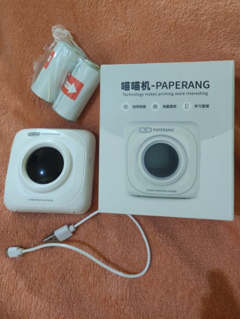 PAPERANG (thermal printer) helpful for printing waybill (Category: Printers, Scanners & Copiers) located in Rizal. Submitted by clv23 (Listing ID 1324585733, Image 2). Description: PAPERANG (thermal printer) helpful for printing waybill *complete set with charging cable and box (what you see is what you get) *barely used Rfs: matatambak lang kasi, sayang naman..ang ganda pa naman gamitin nito *it comes with free thermal paper and sticker paper *F