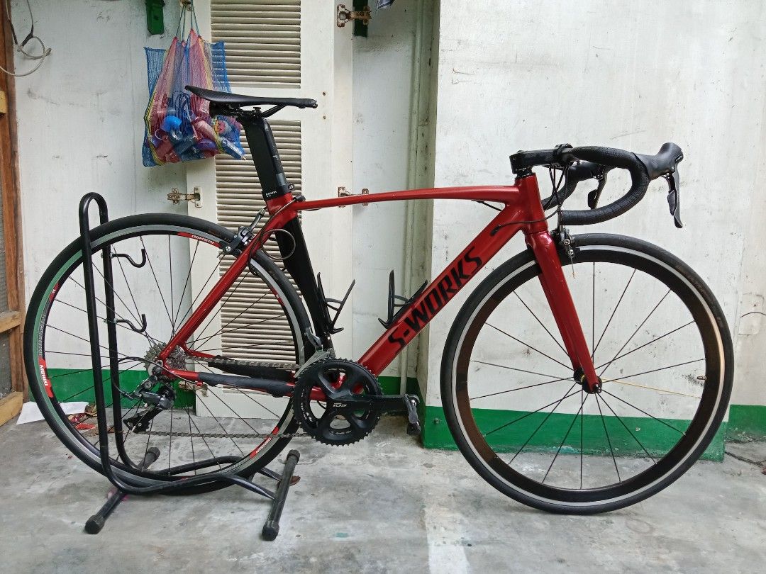 (Road Bike Atomic Covert Aero Frame Size Medium 48) Repainted to S-Works (Category: Bicycles) located in Manila. Submitted by raymart0112 (Listing ID 1324655978, Image 2). Description: For Sale Road Bike Atomic Covert alloy frame rim brake Fork: Alloy Fork Fd: Shimano Claris r2000 Rd: Shimano Claris r2000 9 speed Cogs: Shimano HG 201 9speed 11-30t Crankset :Shimano 105 5800 2x 53-39t Brake Caliper and Break Pads: Shimano Claris r2000 Front and Re