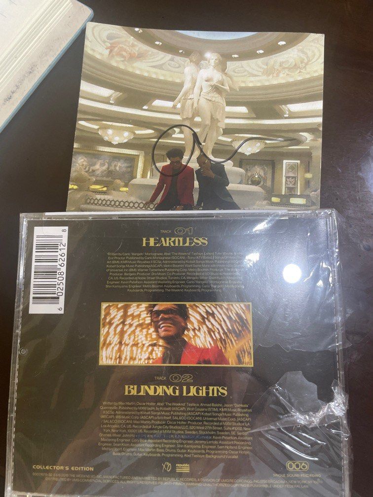 The Weeknd- Signed Blinding Lights/Heartless CD (Category: CDs & DVDs) located in Manila. Submitted by stefandraboutique (Listing ID 1324630867, Image 2). Description: Get this rare and limited edition Signed Blinding Lights/Heartless CD by The Weeknd.