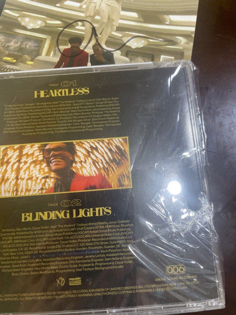 The Weeknd- Signed Blinding Lights/Heartless CD (Category: CDs & DVDs) located in Manila. Submitted by stefandraboutique (Listing ID 1324630867, Image 3). Description: Get this rare and limited edition Signed Blinding Lights/Heartless CD by The Weeknd.