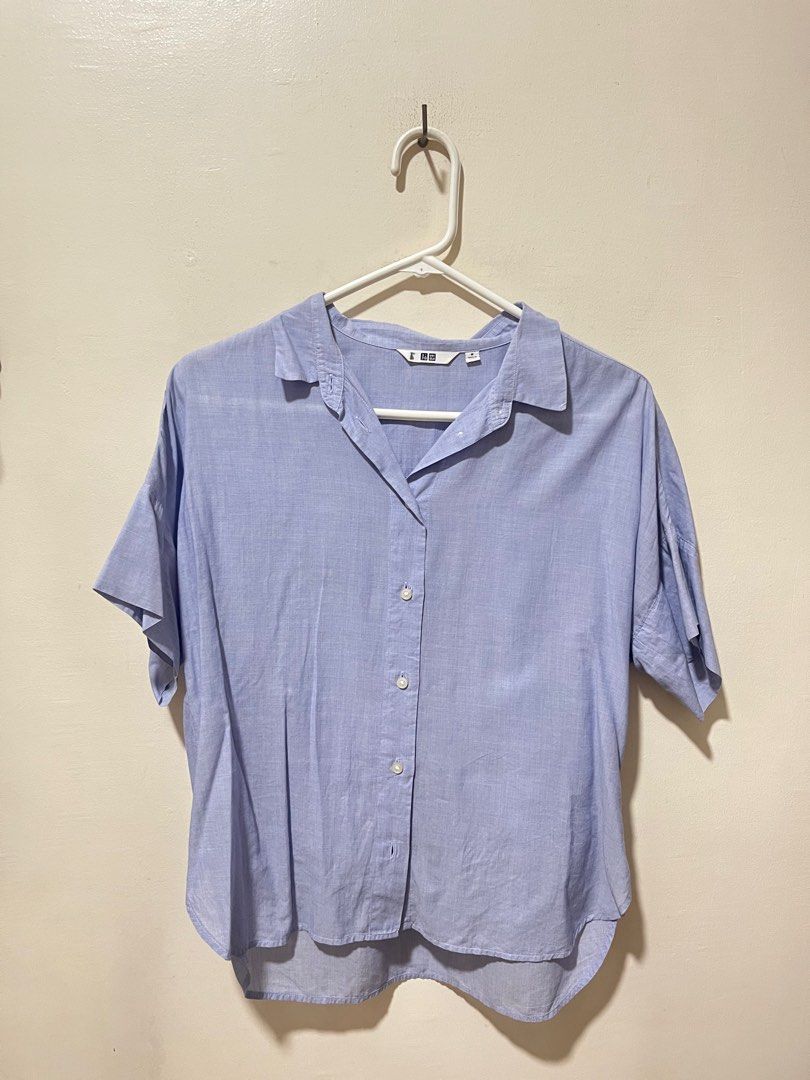 Uniqlo powder blue polo (Category: Blouses) located in Angeles City. Submitted by endzn (Listing ID 1324659660, Image 1). Description: - fits M to L .