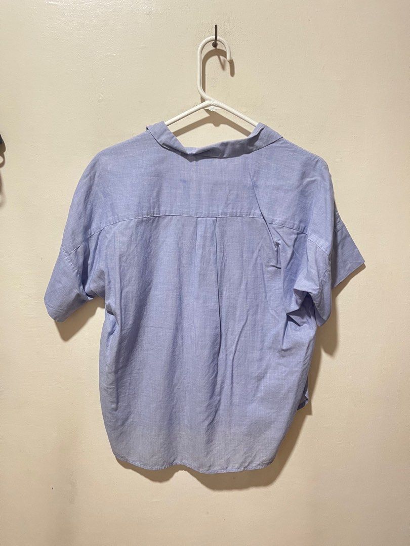 Uniqlo powder blue polo (Category: Blouses) located in Angeles City. Submitted by endzn (Listing ID 1324659660, Image 3). Description: - fits M to L .