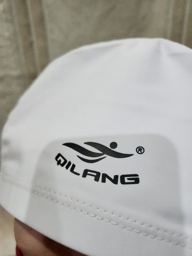 White Swimming cap (Category: Water Sports) located in Lingayen. Submitted by brulee21 (Listing ID 1324712554, Image 2). Description: bought it online for a swimming comp, but used my old cap rfs: decluttering.