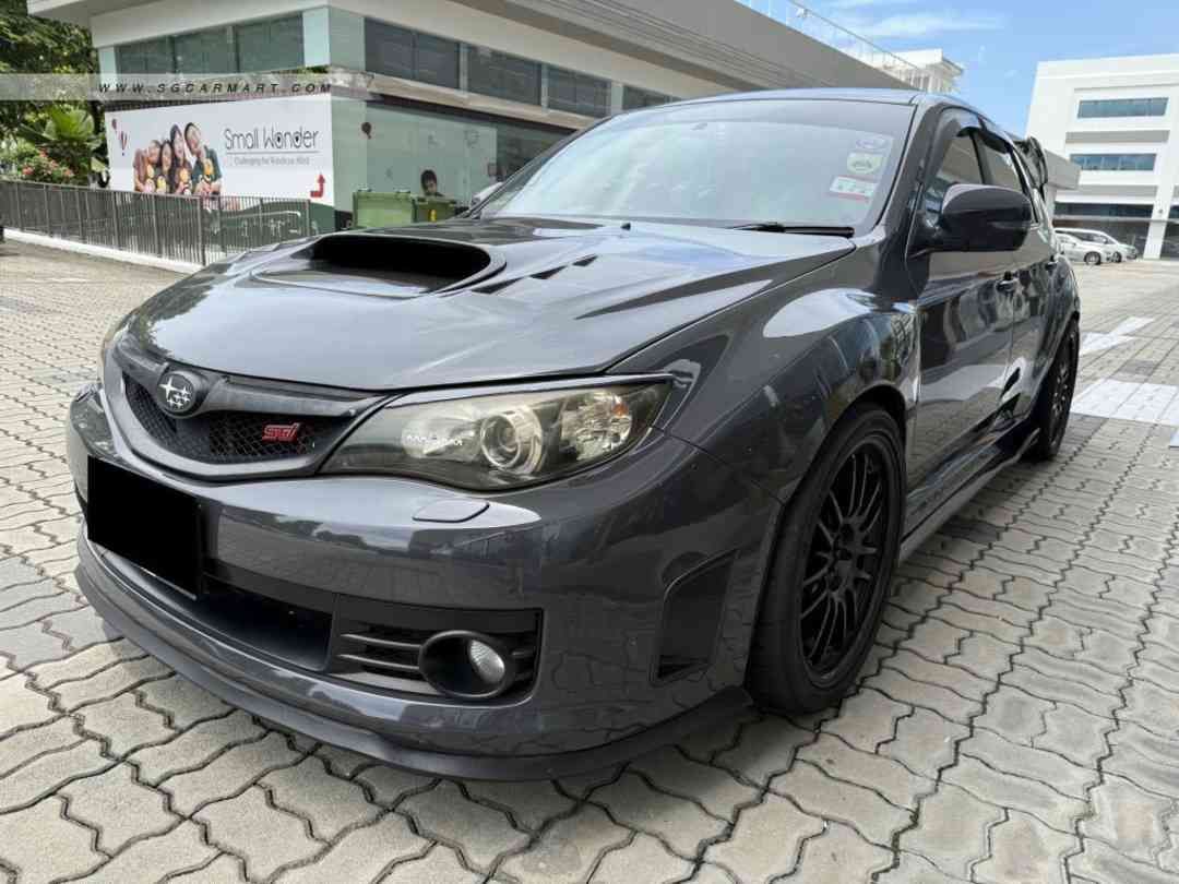 Subaru Impreza WRX 5D 2.5 STI (M) (Category: Used Cars) located in Singapore. Submitted by europerformance (Listing ID 1373143478, Image 2). Description: Features: 2.5l Turbocharged Engine, 6 Speed Bulletproof Manual Transmissions, Symmetrical All Wheel Drive System, Multi Function Control Steering Accessories: LTA Approved Fujisubo Exhaust. Exedy Clutch. CarPlay. Full Defi Gauges. Greddy Boost Controller. Forged RE30 Rims. Carbon Interior. Re-up