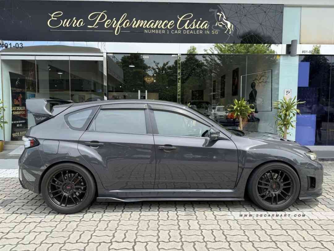 Subaru Impreza WRX 5D 2.5 STI (M) (Category: Used Cars) located in Singapore. Submitted by europerformance (Listing ID 1373143478, Image 3). Description: Features: 2.5l Turbocharged Engine, 6 Speed Bulletproof Manual Transmissions, Symmetrical All Wheel Drive System, Multi Function Control Steering Accessories: LTA Approved Fujisubo Exhaust. Exedy Clutch. CarPlay. Full Defi Gauges. Greddy Boost Controller. Forged RE30 Rims. Carbon Interior. Re-up
