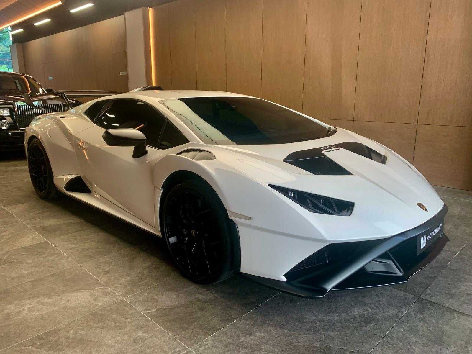 LAMBORGHINI HURACAN STO COUPE RWD (Category: Used Cars) located in Singapore. Submitted by motorway (Listing ID 1376662210, Image 2). Description: Agent Unit! 3 Drive Modes: STO, Trofeo (track), and Pioggia (wet). Road Legal race car. Rear-wheel steering, Adjustable racing suspension. 43 kg lighter than Huracan Performante. Trade In Welcome! Easy And Flexible Finance Options Available. Contact Our Professional Sales Team Now. Features: 5.2L natur