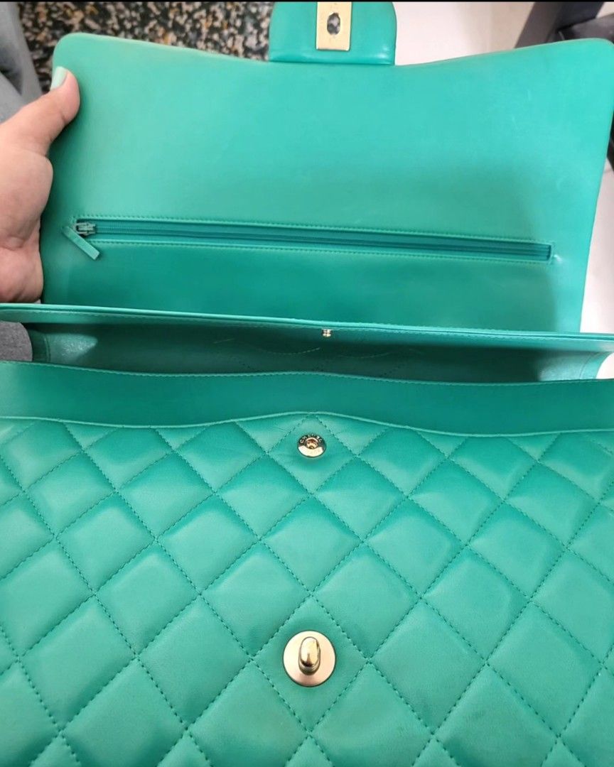 Authentic Chanel Green Maxi Double Flap Lambskin Bag (Category: Luxury Bags & Wallets) located in Antipolo. Submitted by frostymmer (Listing ID 1344928060, Image 3). Description: Authentic Chanel Green Maxi Double Flap Lambskin Bag With non branded dustbag Series 17 guaranteed authentic! selling low! with rubs on the corners. pass sa hagglers, lowballers and sa kwentuhan lang..