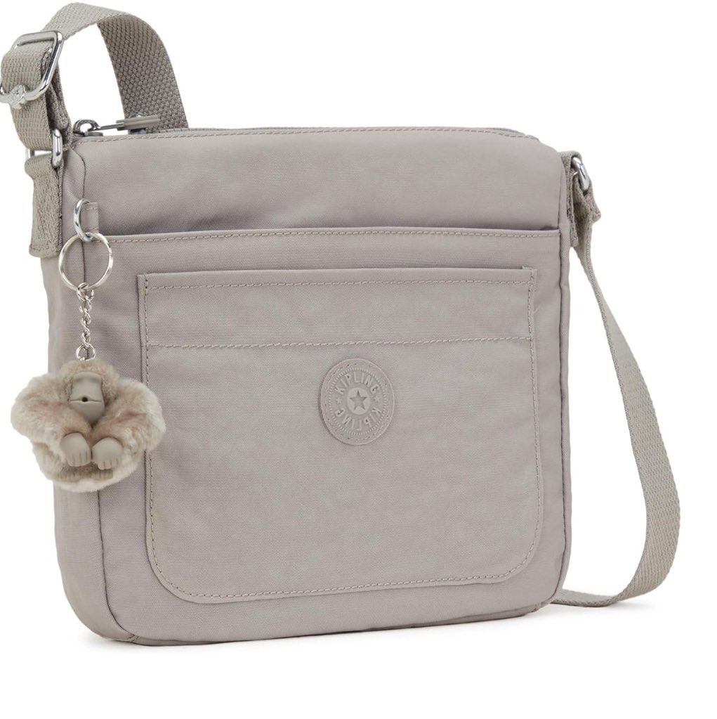 Kipling bag (Category: Cross-body Bags) located in Singapore. Submitted by ja (Listing ID 1344822945, Image 1). Description: Brand new Kipling cross body bag in grey 9.25x8.5x1.75inch.