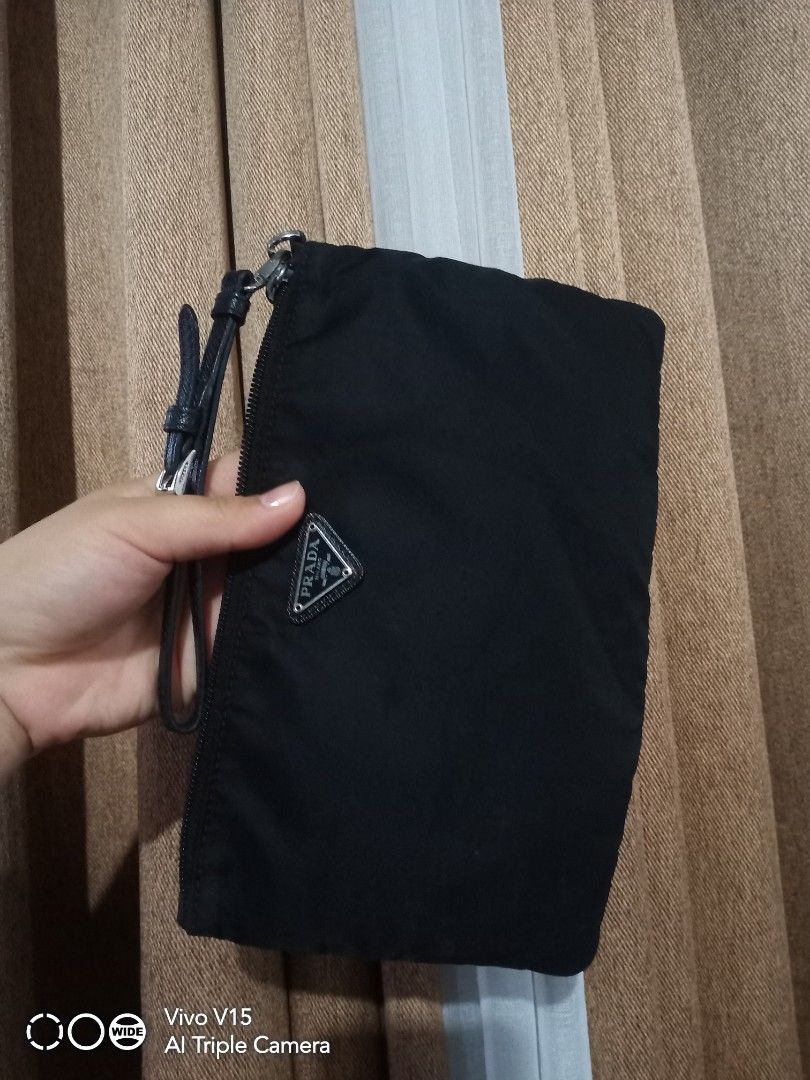 orig.prada (Category: Luxury Bags & Wallets) located in Tagum. Submitted by luxbagelyas (Listing ID 1340407518, Image 3). Description: very good condition black na black not faded kasya long wallet sign of use only maganda pa nylon material Japan item.