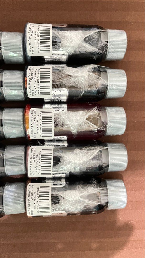 Robert Oster Fountain Pen Ink (Category: Stationery & School Supplies) located in Quezon City. Submitted by loisranulf02 (Listing ID 1344760523, Image 3). Description: Selling my Robert Oster Fountain Pen Inks (brand new) 1. Heart of Gold 2. Grun-gilt 3. Red Gold 4. Aussie Liquid Gold 5. Tinseltown 6. Peppermint Candy 7. Candied Mint 8. The Grinch 9. Glistening Orange Rum 10. Sun on the Snow 11. Rose Glit Tynte 12. Terra Australis 1 pc available 