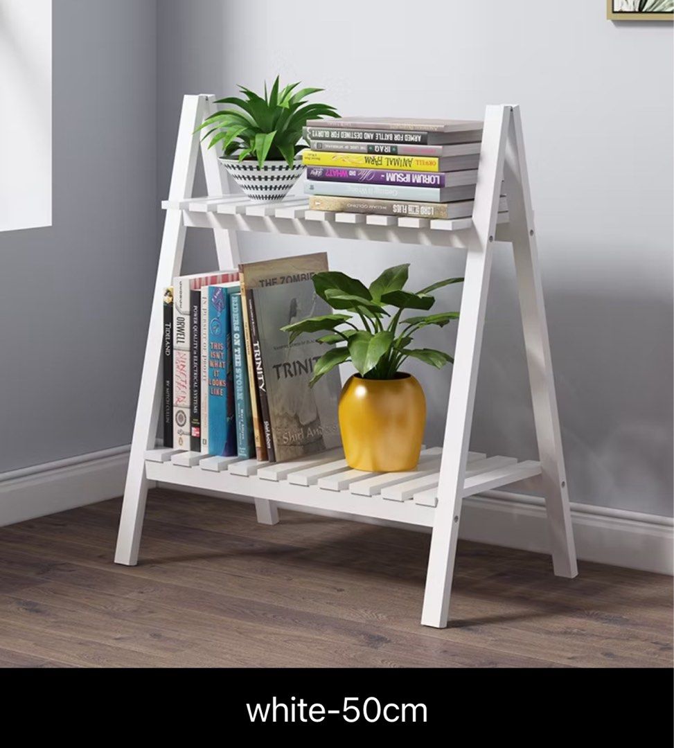 Solid Wood Multi-function Bookshelf (Category: Shelves, Cabinets & Racks) located in Singapore. Submitted by nuramln (Listing ID 1344927882, Image 1). Description: Solid Wood Multi-function Bookshelf 📚🪴 Condition: brand new still in packaged box. Price: $15 (bought at $20) / self collect @ Jurong West St 41 or anywhere convenient! ✿ Thank you! ✿.