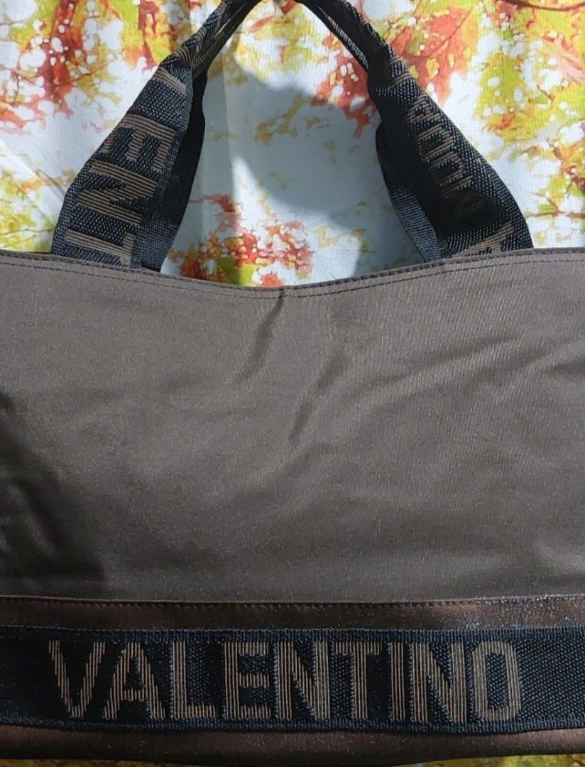 Valentino Bag (Category: Luxury Bags & Wallets) located in Muntinlupa City. Submitted by sakurambo_des (Listing ID 1344890124, Image 3). Description: Personal Preloved Auth.Valentino Wrist/Handbag Nylon Brown 3 compartment Like new condition..