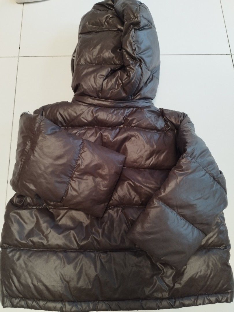 Winter Jacket (Category: Babies & Kids Fashion) located in Singapore. Submitted by juzlurvestoshop (Listing ID 1344834055, Image 2). Description: good condition puffer jacket hood can be removed PTP:37cm length: 37cm sleeve: 46cm (measure from center of neck till cuff).