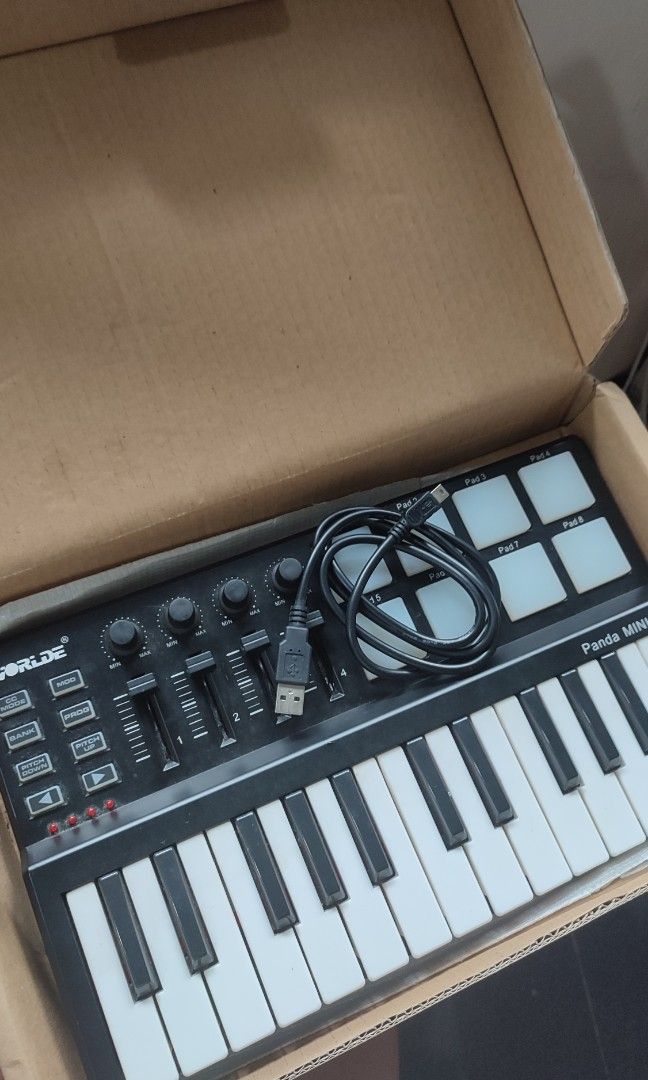 Worlde Panda Compact Midi Controller (Category: Musical Instruments) located in Mandaluyong City. Submitted by thatsoberfriend (Listing ID 1344790270, Image 2). Description: For Sale! Worlde Panda Compact Midi Controller Php 2950 Selling for a friend. Complete with box and usb cable. As is where is. Good for those looking for a basic midi controller. RFS: Upgrade #Midi #Controller #Alesis #Worlde #Korg #Yamaha #Novation.