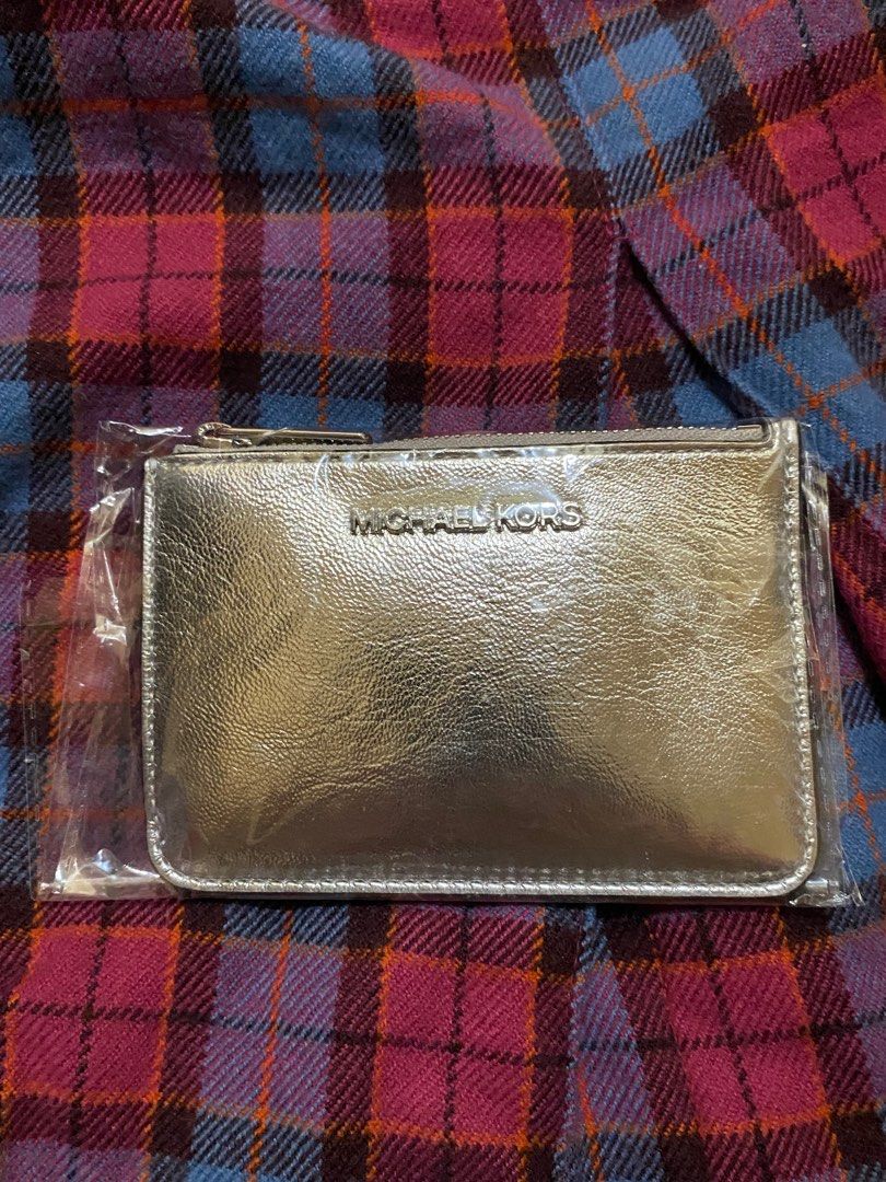 Authentic Michael Kors Card Holder (Category: Luxury Bags & Wallets) located in Cebu City. Submitted by karent3000 (Listing ID 1346561326, Image 1). Description: Brand new and still intact.
