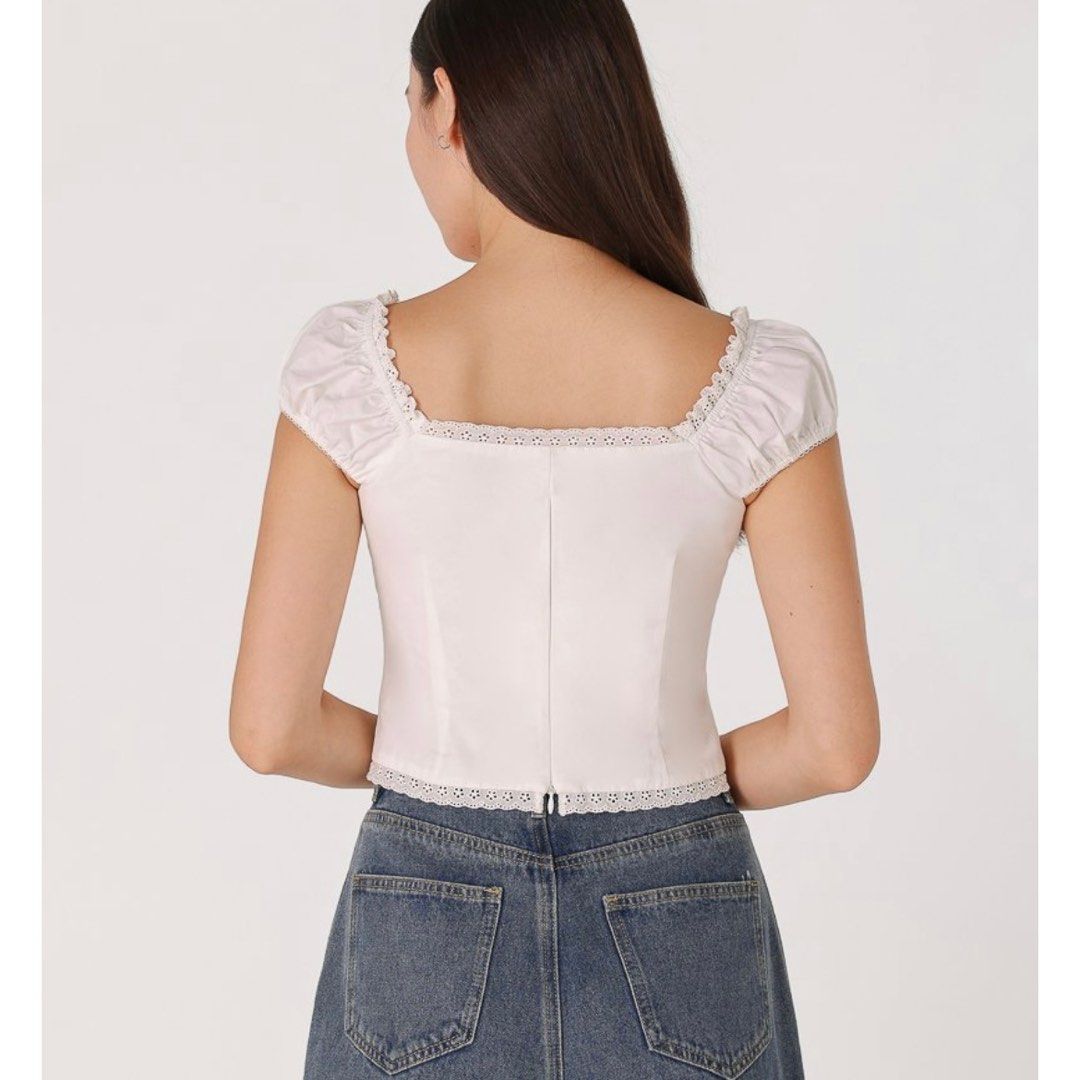 BNWT Lovet Ciera Padded Ribbon Corset Top *sold* (Category: Blouses) located in Singapore. Submitted by th_ellobean (Listing ID 1346621899, Image 2). Description: RTP $37.90 BNWT. Selling to clear- cheapest on carousell. No negos no trades, I will not bother replying due to reply quota Material: Cotton blend Lining: Fully lined except for sleeves Sheerness: Non sheer Stretchability: No stretch Features: Concealed back zipper Functional front clas