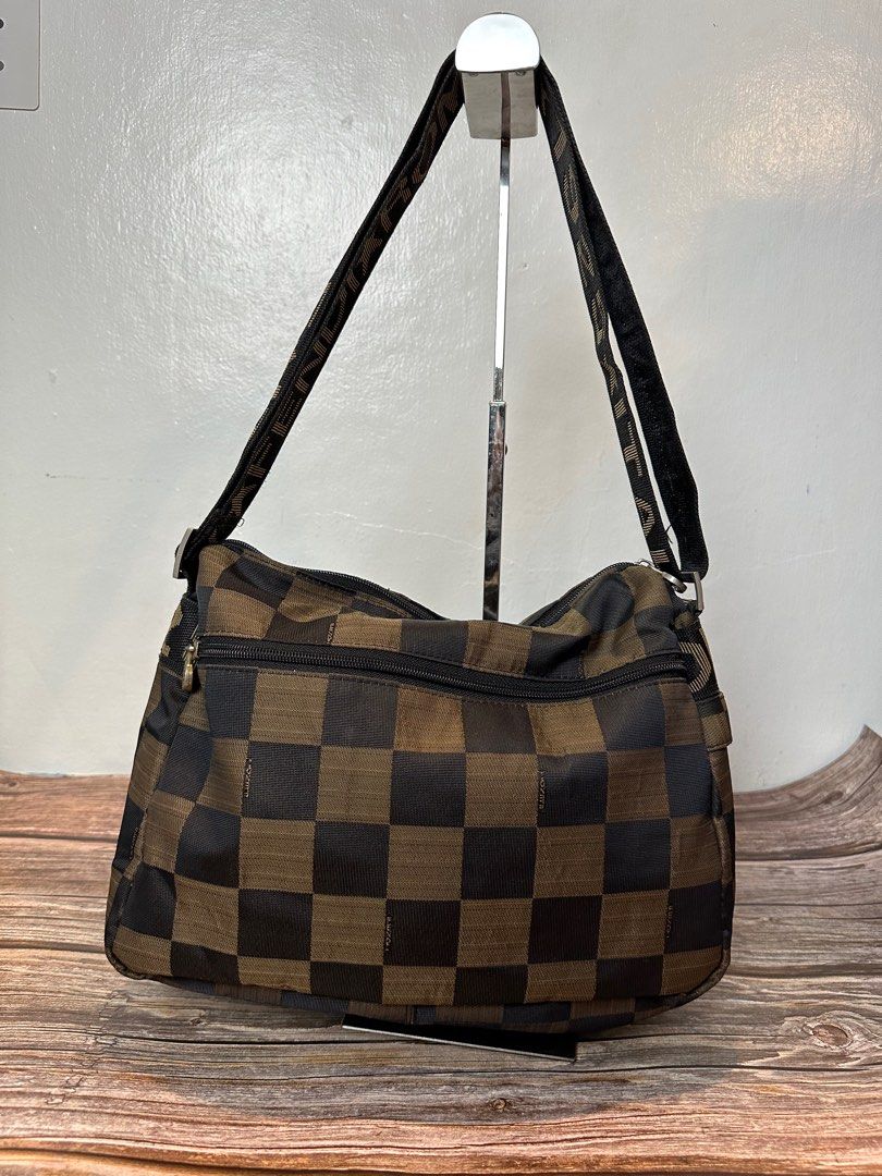Fendi Checker Board Bag (Category: Luxury Bags & Wallets) located in Iba. Submitted by luxurused (Listing ID 1346538579, Image 2). Description: 1925 Crossbody Checker Board Negotiable please self authenticate available unless marked sold/reserved.