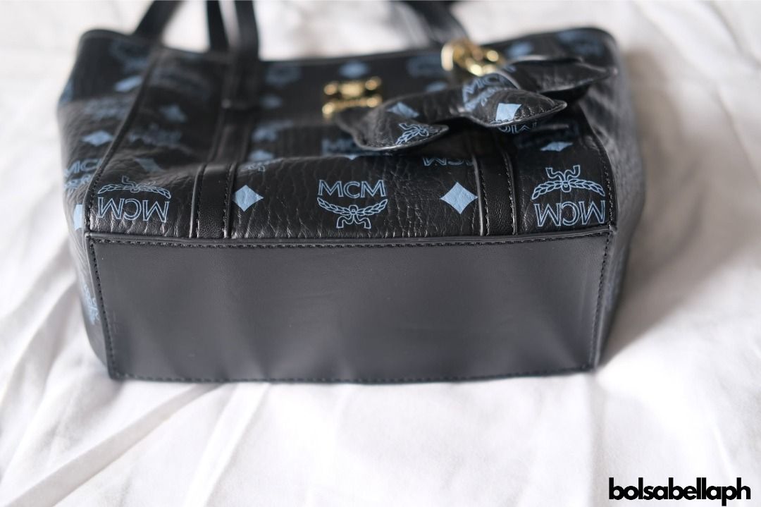 MCM Toni Top Zip Shopper (Category: Luxury Bags & Wallets) located in Mandaluyong City. Submitted by bolsabellaph (Listing ID 1346629840, Image 2). Description: Coded with barcode from brand. Rank A, Very good condition, showing minor but negligible signs of wear. *All items are 100% authentic and original, unless stated NGA on the product details. — Disclaimer: BOLSABELLAPH is not associated or affiliated with the brand holders. All copyrights a