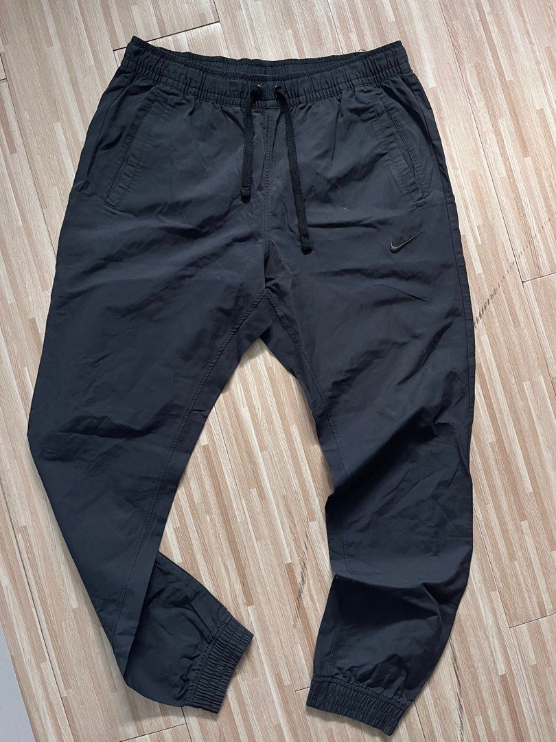 Nike tapered jogger pants (Category: Joggers) located in Quezon City. Submitted by charddaddy (Listing ID 1346623348, Image 1). Description: Nike tapered jogger Medium 30-34 width 38 length Excellent condition Issue: light stain sa likod.