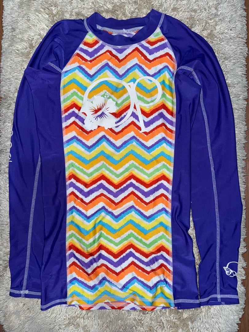 OP Purple Rash Guard (Category: Rash guard) located in Manila. Submitted by bernicecam (Listing ID 1346607594, Image 1). Description: Length: 24.5in Sleeve Length: 23in Shoulder: 12.5in Bust: 30in.