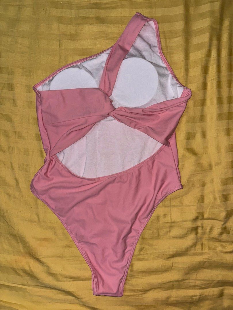 Pink Sexy One Piece Swimsuit (Category: Bikinis & Swimsuits) located in Del Monte. Submitted by jesmandy11 (Listing ID 1346608561, Image 2). Description: Never been worn. Padded Large Rfs - wrong size.