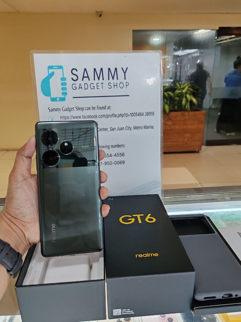 Realme gt6 5g (Slightly use) (Category: Realme) located in Quezon City. Submitted by ronalynac40976 (Listing ID 1346619631, Image 1). Description: realme gt6 5g 12ram 256 rom complete package good condition pick up store in greenhills shopping center we accept creditcard installment +% we accept swap/trade in we accept ggives & spaylater+% we ship nationwide via lbc dm or call for fast transaction 09279500069/09425544556 located @ Aquarium area s