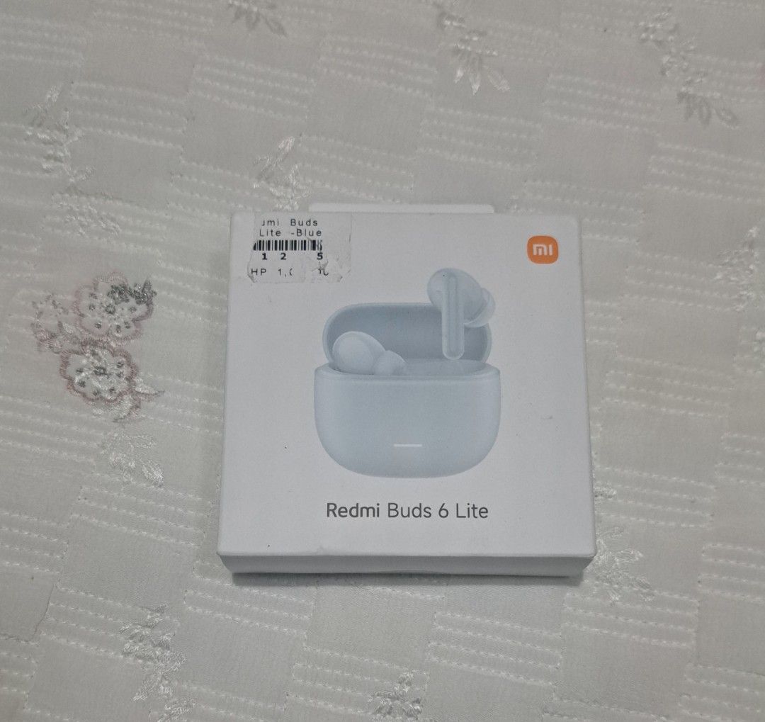 Redmi buds 6 lite (Category: Earphones) located in Tayasan. Submitted by _raceprettyconcept (Listing ID 1346601394, Image 1). Description: brandnew sealed.