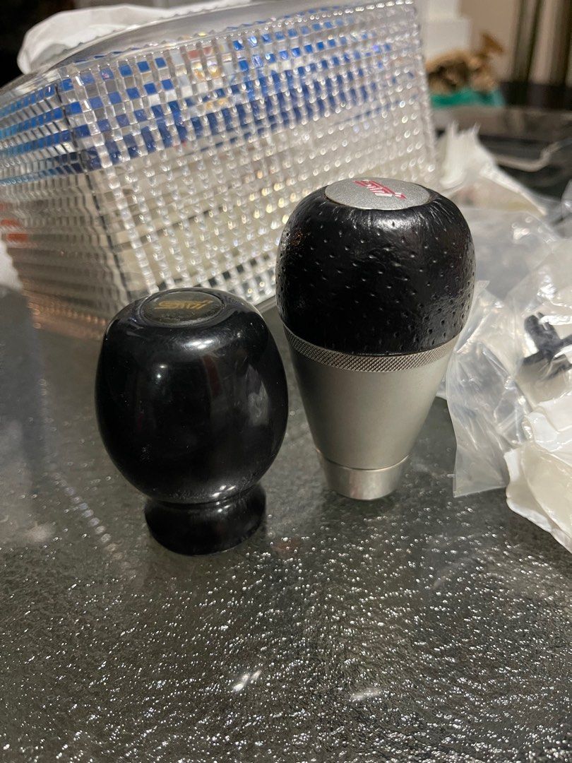 Subaru STI gear shift knobs (Category: Interior Styling & Trim) located in Singapore. Submitted by sayne (Listing ID 1346632192, Image 1). Description: Price is per piece. Out of production. Used on V9 hatch WRX previously. Black $70 - duracon shift knob; manual, but installed removable adapter to fit auto thread Silver $100- aluminium weighted; auto only Condition as per photos. No refunds..