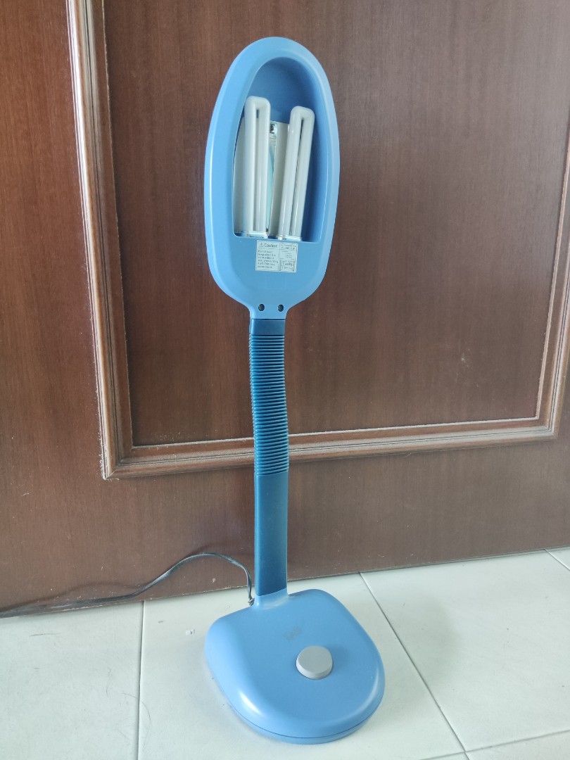 Adjustable Table Lamp (Category: Lighting) located in Singapore. Submitted by kevezi (Listing ID 1346779113, Image 2). Description: Well-lit and useful adjustable lamp. Previously used for night studying, now clearing up items! Conditions still good as shown in the photos. 2-pin power cord comes together. PM if interested! :).