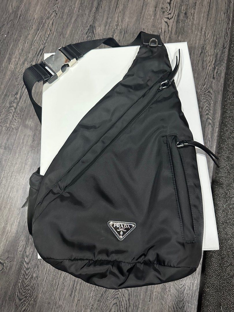 Authentic Prada Crossbody/bodybag re-nylon backpack (Category: Luxury Bags & Wallets) located in Manila. Submitted by raintan888 (Listing ID 1346733616, Image 1). Description: Selling authentic prada crossbody nylon bodybag Correct model: Re-Nylon Backpack Purchased locally in solaire Condition: like new. Used it for a few times only RFS: bought new bag Price: Php 140,000.00 Purchased last year For more info: https://www.prada.com/ww/en/p/re-nylo