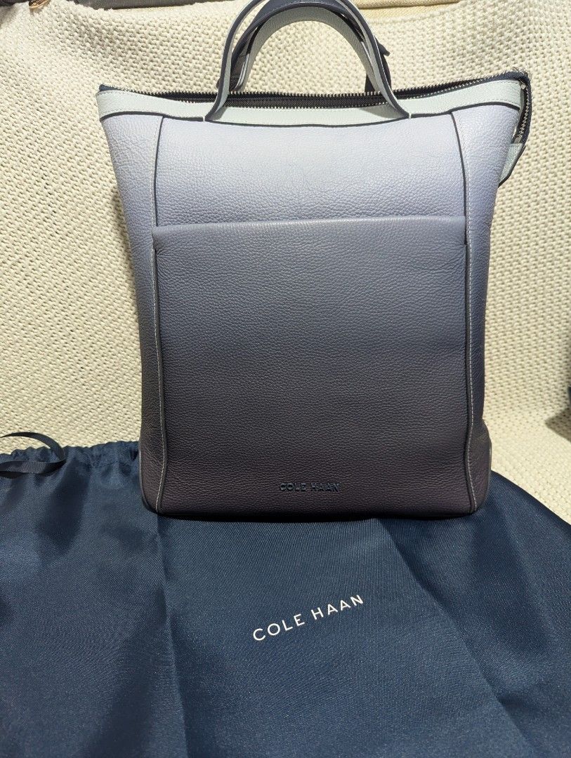 Cole Haan authentic Leather laptop convertible bag (Category: Laptop Bags & Sleeves) located in Manila. Submitted by declutter_777 (Listing ID 1346669193, Image 3). Description: Crafted in genuine leather. 13.5" 13" x3.5". 21" adjustable strap 2.5" handle drop. Crafted in leather with a washable nylon interior and nylon straps. Secured zip top closure. Exterior front zip pocket. Padded interior laptop sleeve, fits up to 13" laptops or tablets. Fo
