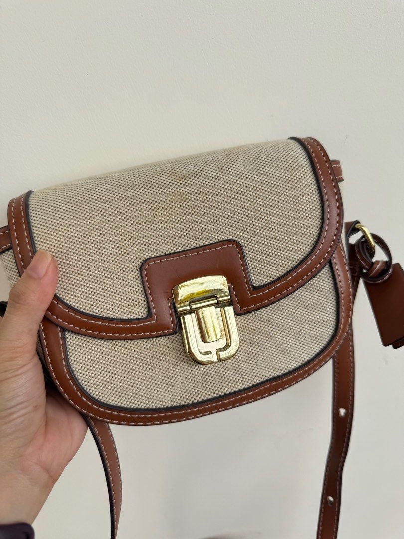 Crossbody canvass bag (Category: Cross-body Bags) located in Santa Ana. Submitted by davyjoy (Listing ID 1346678723, Image 2). Description: Crossbody canvas bag Brown leather Bought from south korea With signs of usage but can be cleaned Adjustable straps.