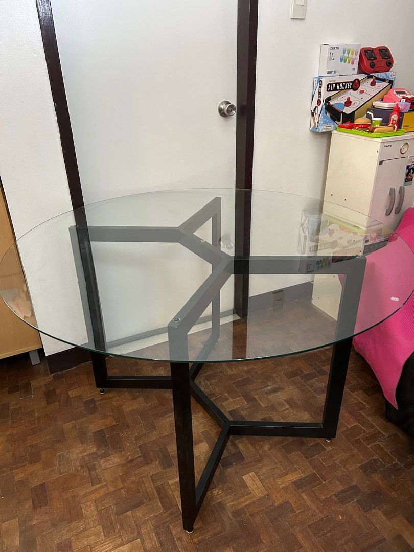 Custom-made Glasstop Dining Table (Category: Tables & Sets) located in Manila. Submitted by beyondborders_ph (Listing ID 1346743907, Image 1). Description: ‼️FOR SALE‼️ Custom-made tempered glass metal table ₱5000 All-metal frame (adjustable for uneven flooring) Tempered glasstop RFS: We have a new dining set Lalamove pick up in Parañaque mop: gcash, gotyme, Unionbank.