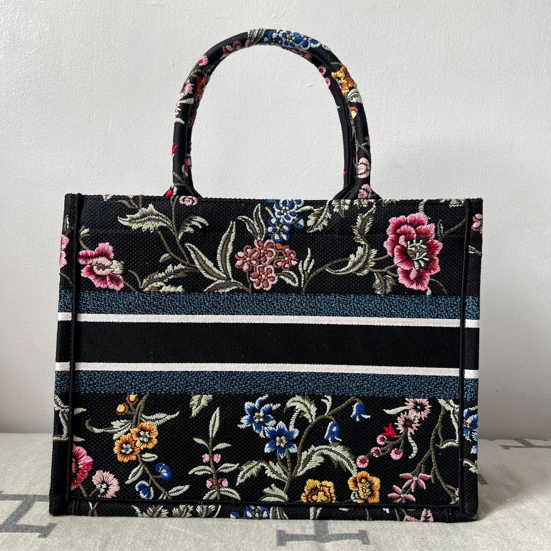 Dior Medium Book Tote Bag (Category: Luxury Bags & Wallets) located in Antipolo. Submitted by chanchimj (Listing ID 1325363160, Image 2). Description: The bag's large size can accommodate a 15-inch laptop, a pouch, a wallet, a phone, sunglasses and lipstick 14 x 11 x 6.5 inches Dust bag included.